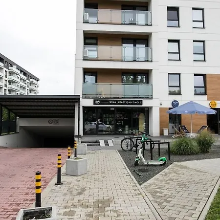 Апартаменты Nowoczesny Dabska Arena / Parking